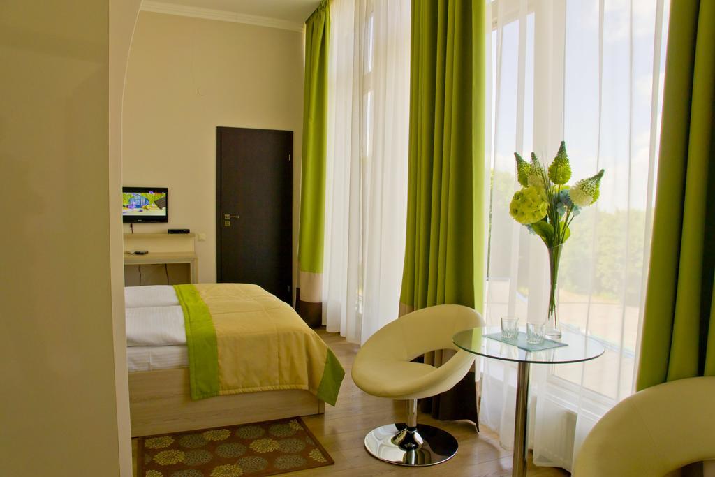 Hotel Merkuriy Leópolis Habitación foto