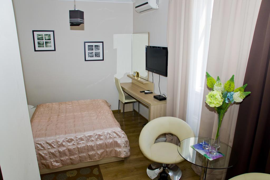 Hotel Merkuriy Leópolis Habitación foto