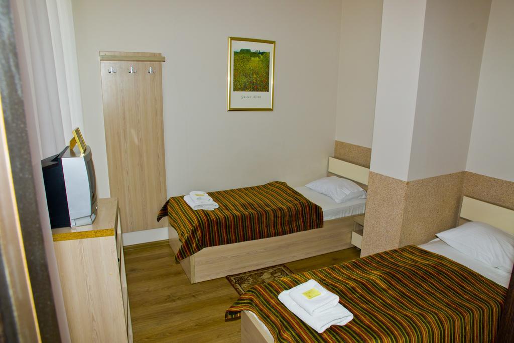 Hotel Merkuriy Leópolis Habitación foto