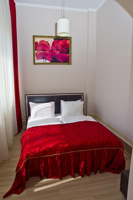 Hotel Merkuriy Leópolis Habitación foto